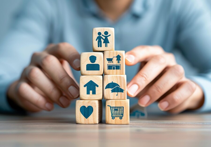 man playing with wooden blocks that say family family 763111 264310